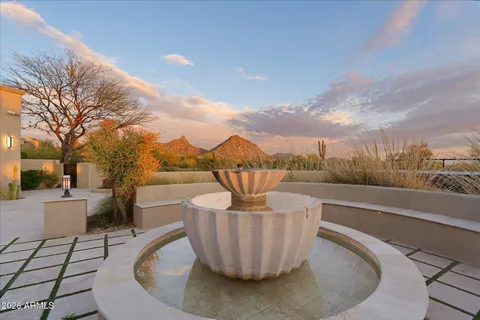 a view of a house with a yard and garage