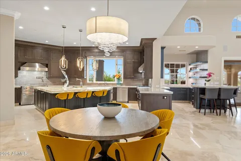 a outdoor dining space with furniture and window