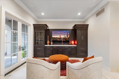 a living room with furniture a rug and a fireplace