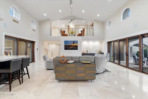 a view of a living room and a wooden floor