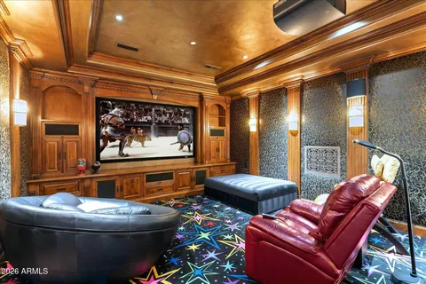 a bathroom with a glass door shower and a sink