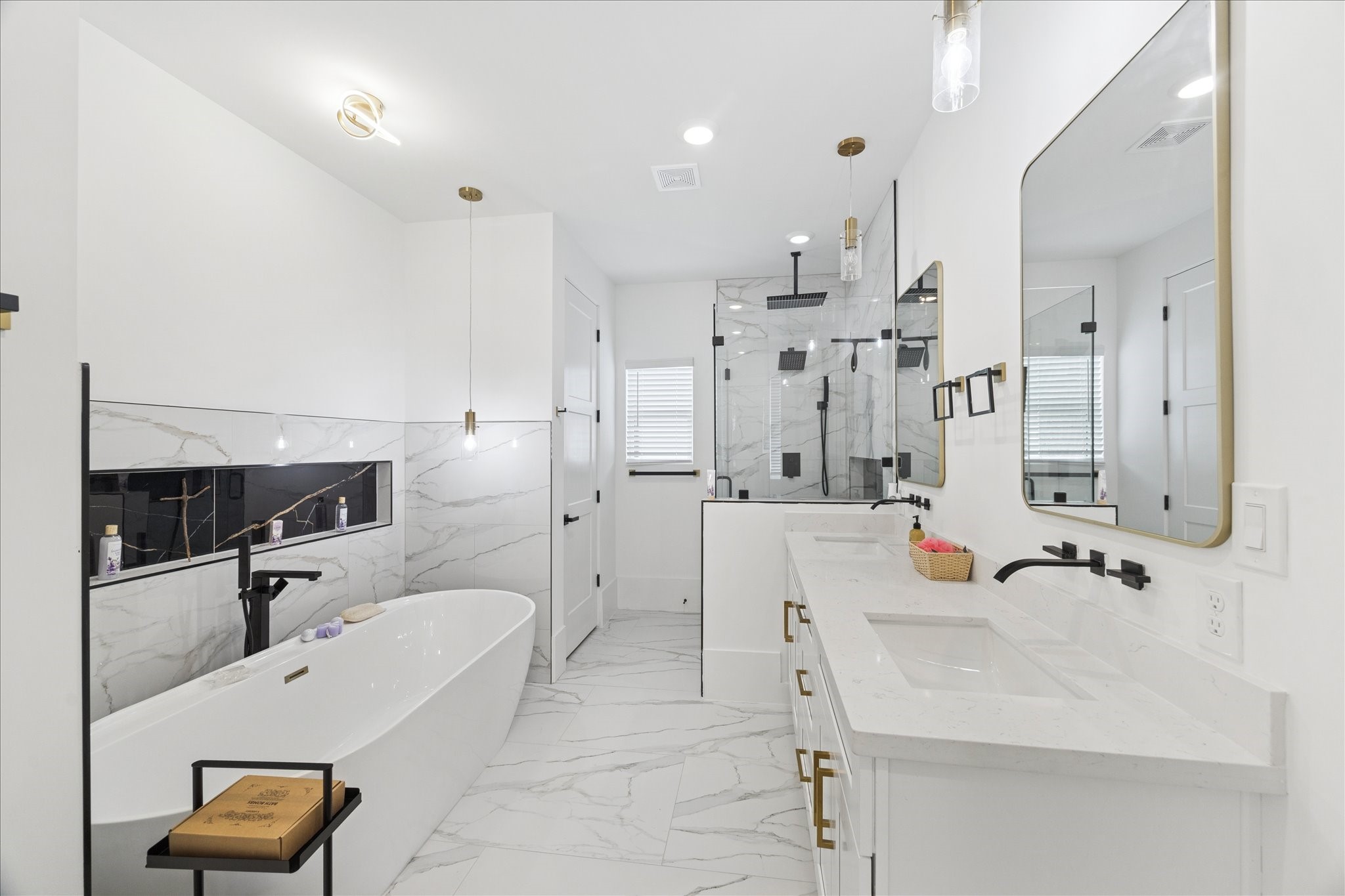 9233 Madera Road Houston, TX 77078 - Photo 14 of 25 a bathroom with a tub sink shower and mirror