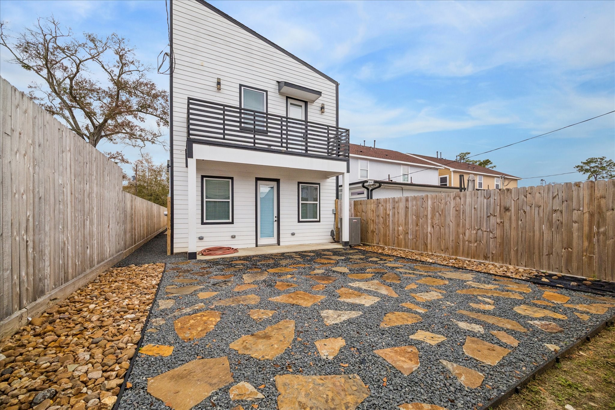 9233 Madera Road Houston, TX 77078 - Photo 25 of 25 a front view of a house with a yard