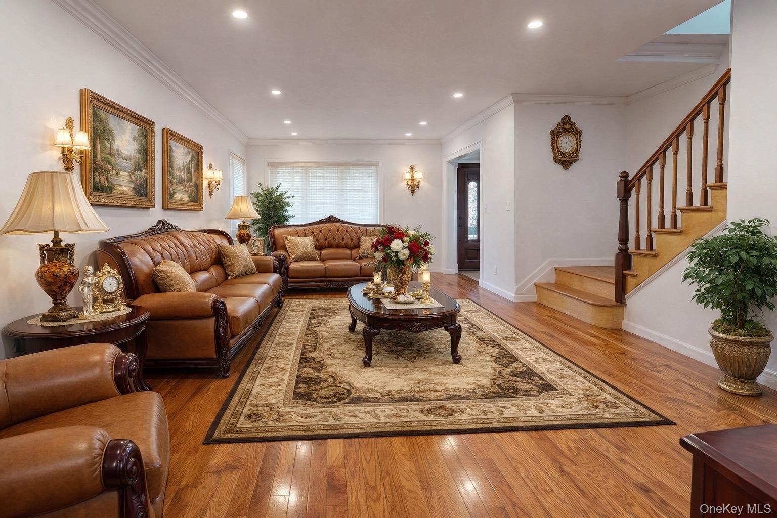219-42 141st Road Queens, NY 11413 - Photo 2 of 23 a living room with furniture and a potted plant