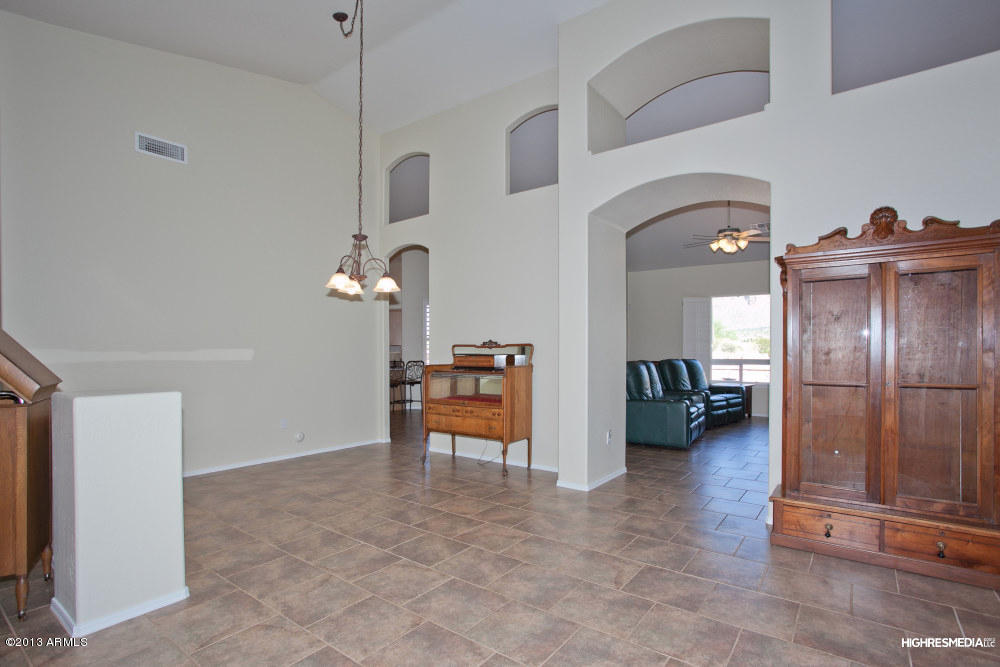 365 North Muleshoe Road Apache Junction, AZ 85119 - Photo 11 of 54 a view of a livingroom with furniture and an entryway
