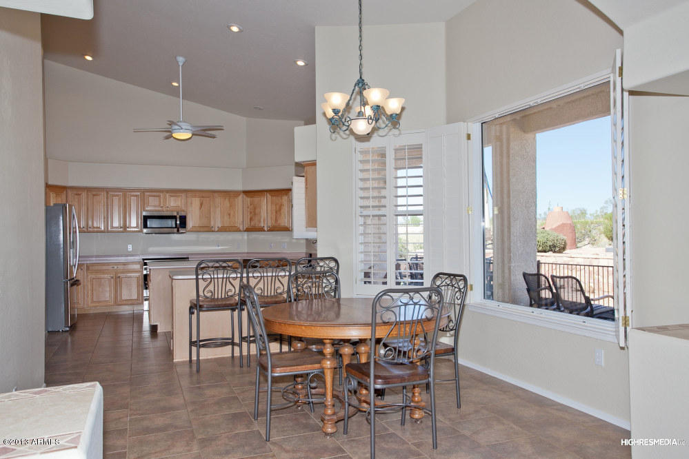 365 North Muleshoe Road Apache Junction, AZ 85119 - Photo 21 of 54 a view of a dining room with furniture window and outside view