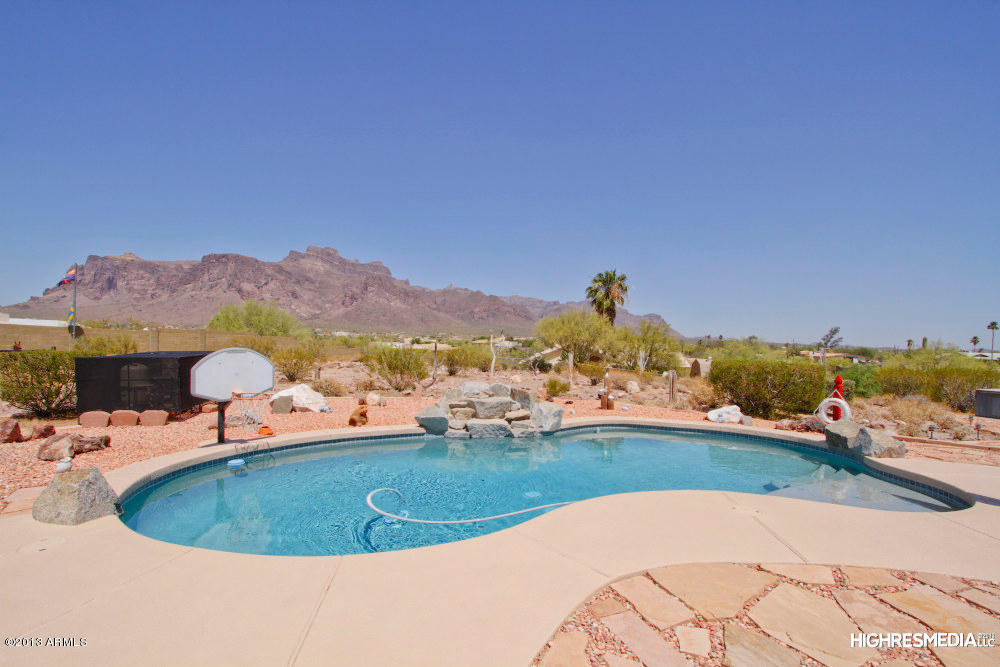 365 North Muleshoe Road Apache Junction, AZ 85119 - Photo 4 of 54 a view of a swimming pool and mountains