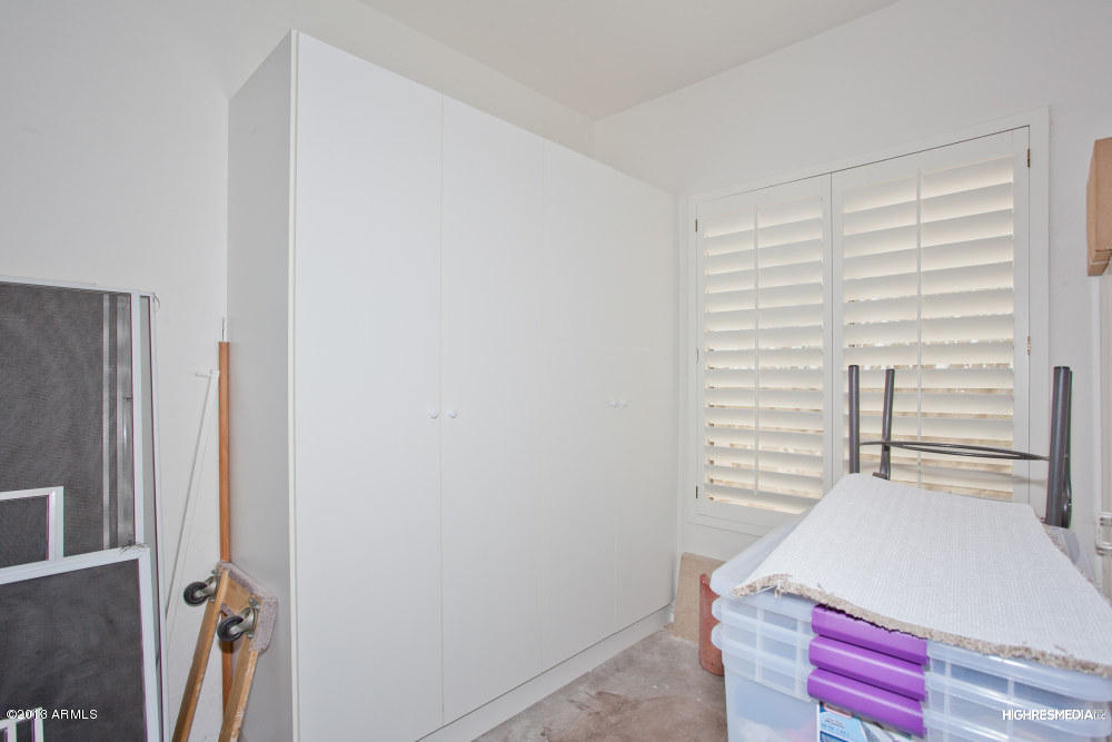 365 North Muleshoe Road Apache Junction, AZ 85119 - Photo 48 of 54 a room with a bed and a window