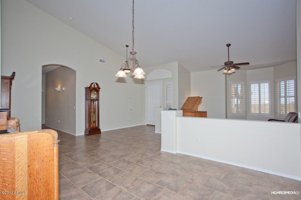 365 North Muleshoe Road Apache Junction, AZ 85119 - Photo 7 of 54 a view of a livingroom with a chandelier furniture and a chandelier