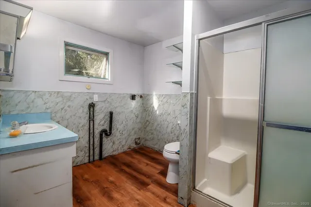 a view of a hallway with windows