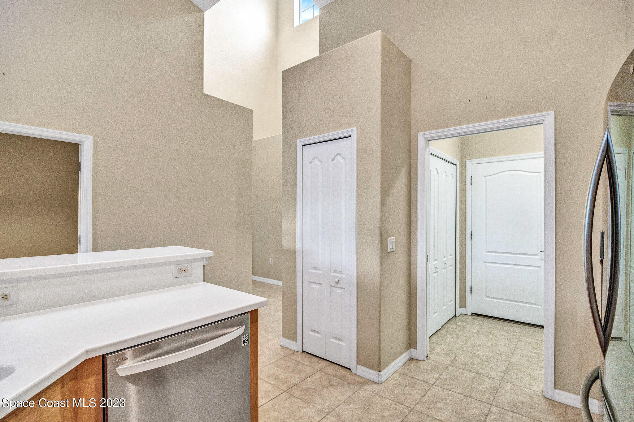 3071 Le Conte Street Melbourne, FL 32940 - Photo 12 of 41 a utility room with dryer and washer