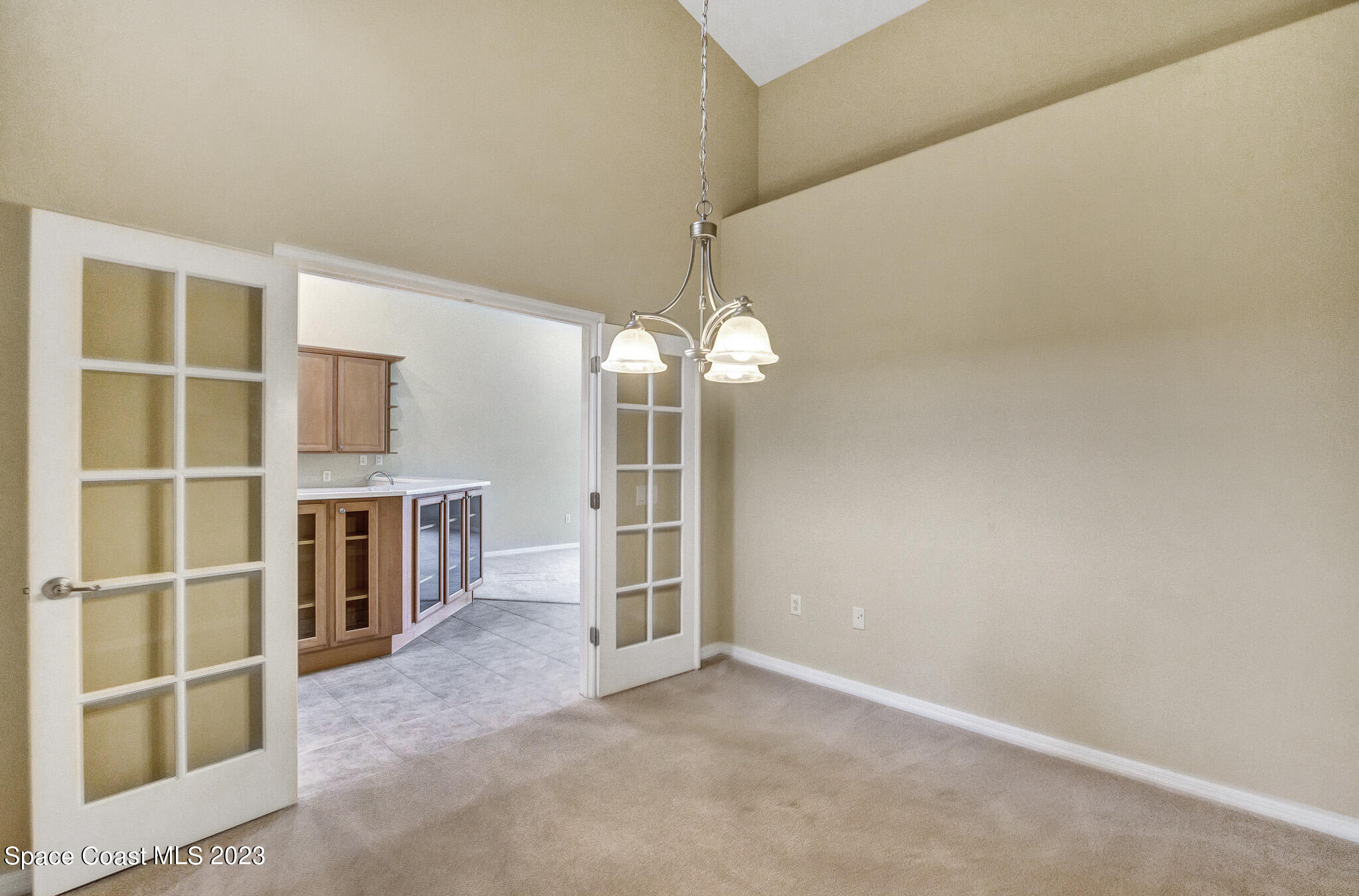 3071 Le Conte Street Melbourne, FL 32940 - Photo 17 of 41 a view of a livingroom with an empty space and a window