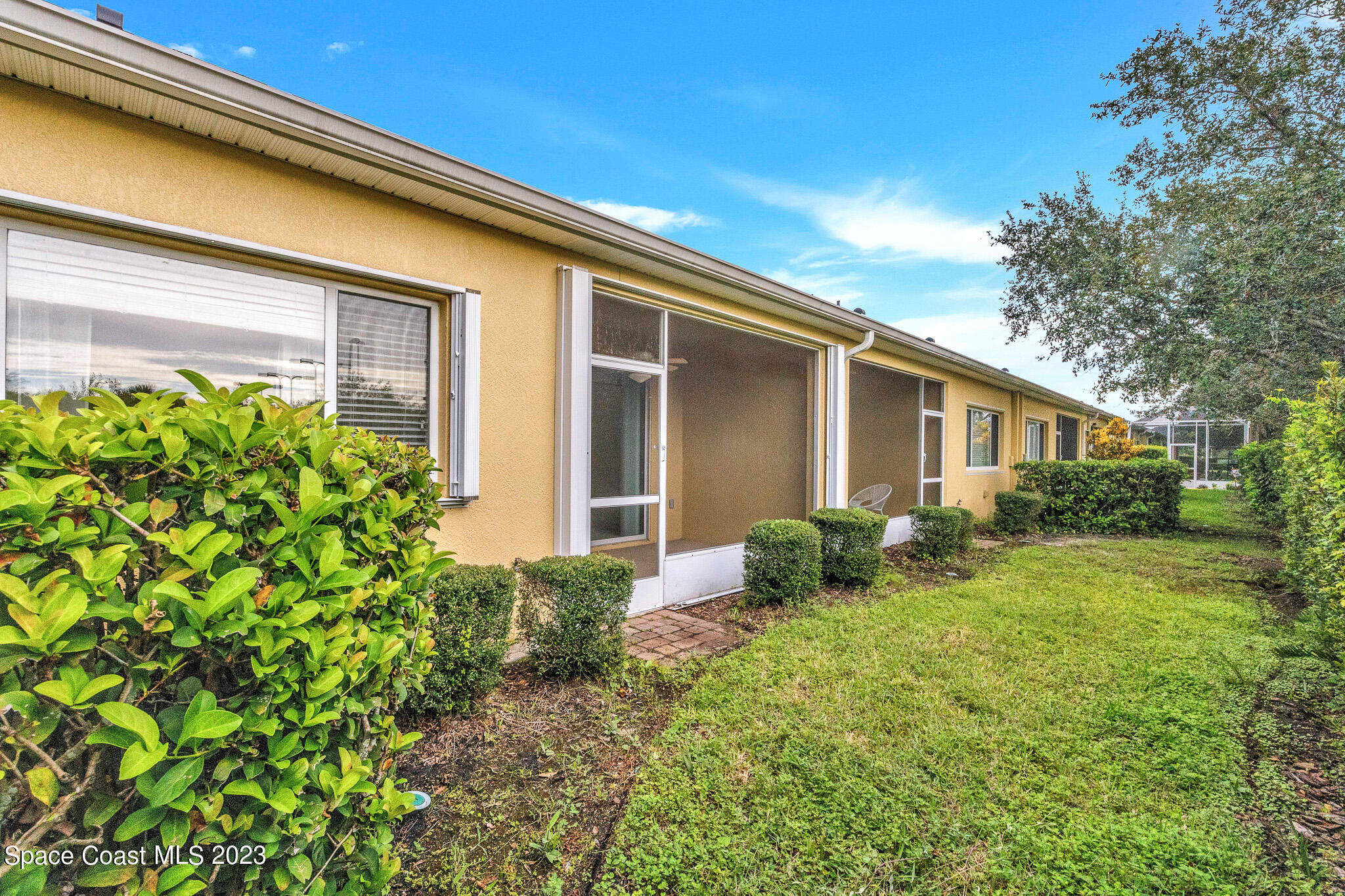 3071 Le Conte Street Melbourne, FL 32940 - Photo 22 of 41 a view of backyard with plants and garden