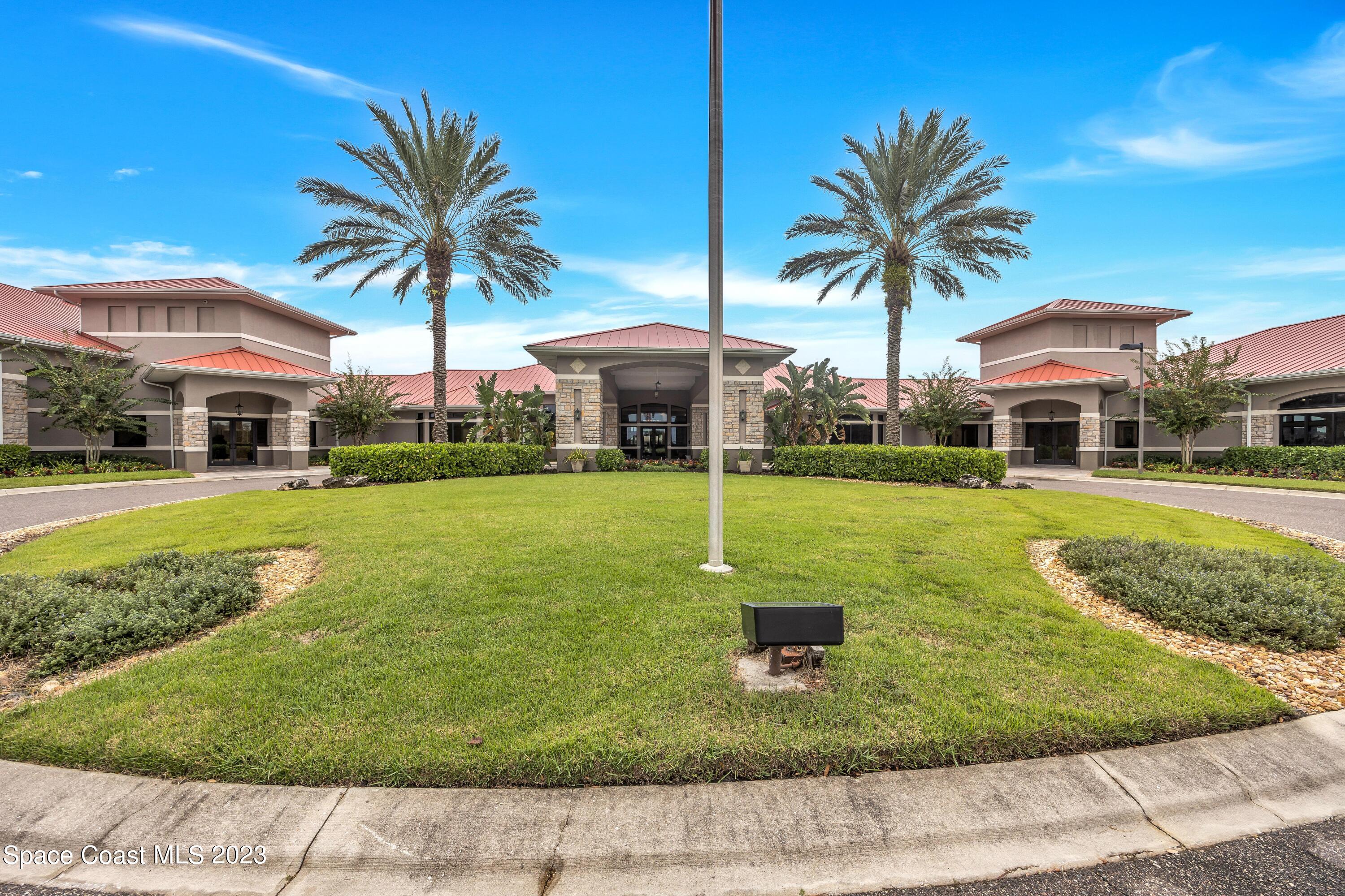 3071 Le Conte Street Melbourne, FL 32940 - Photo 32 of 41 a view of a house with swimming pool and yard