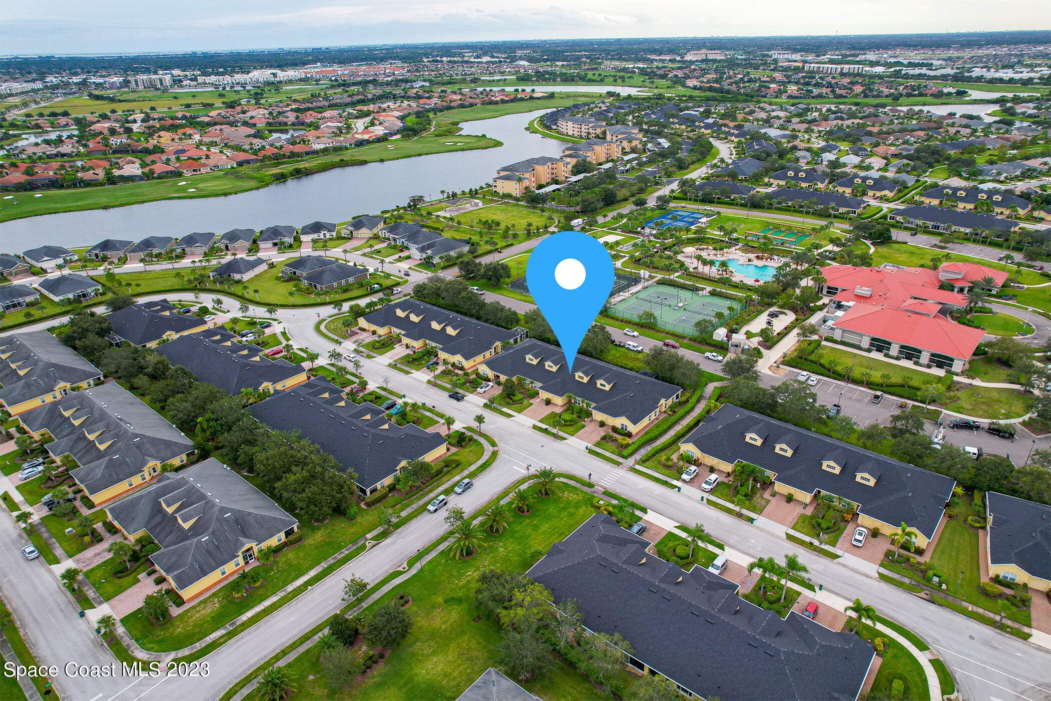 3071 Le Conte Street Melbourne, FL 32940 - Photo 39 of 41 an aerial view of residential houses with outdoor space