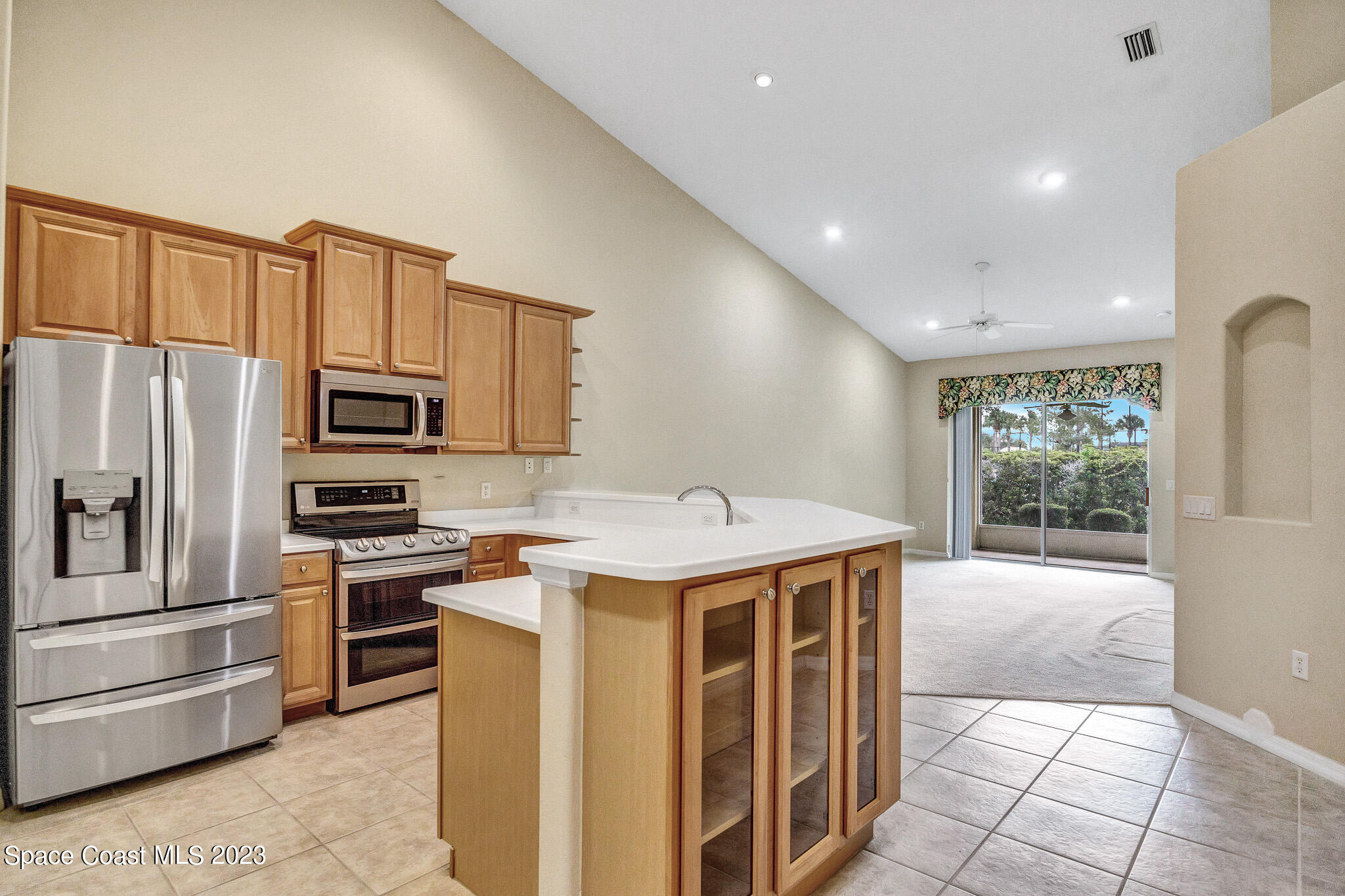 3071 Le Conte Street Melbourne, FL 32940 - Photo 4 of 41 a kitchen that has a cabinets and steel stainless steel appliances