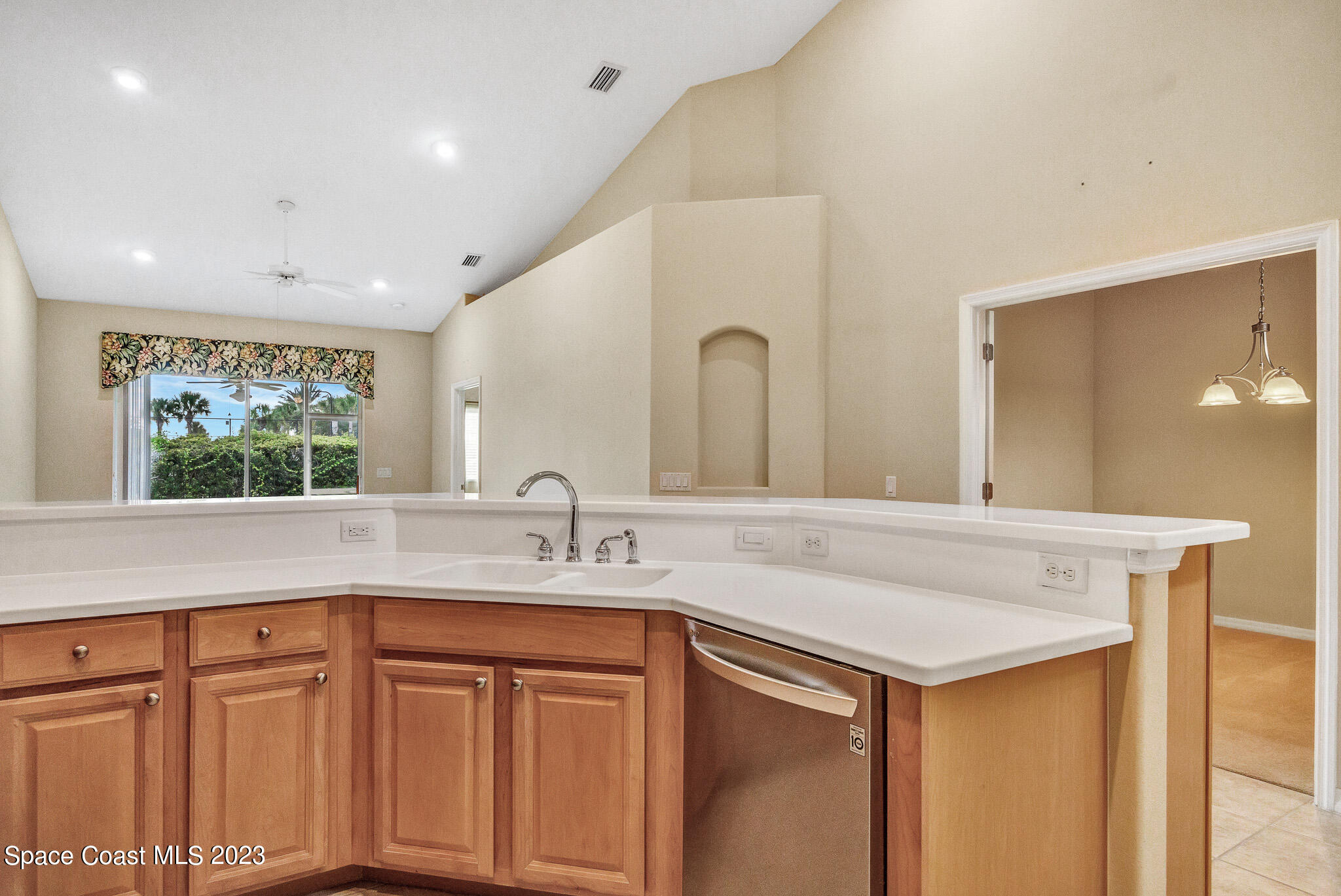 3071 Le Conte Street Melbourne, FL 32940 - Photo 10 of 41 a kitchen with a sink and a window