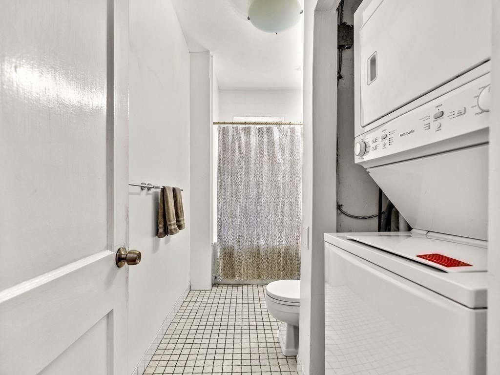 5 Spofford Road, Unit 8 Boston, MA 02134 - Photo 12 of 20 a bathroom with a sink toilet and shower