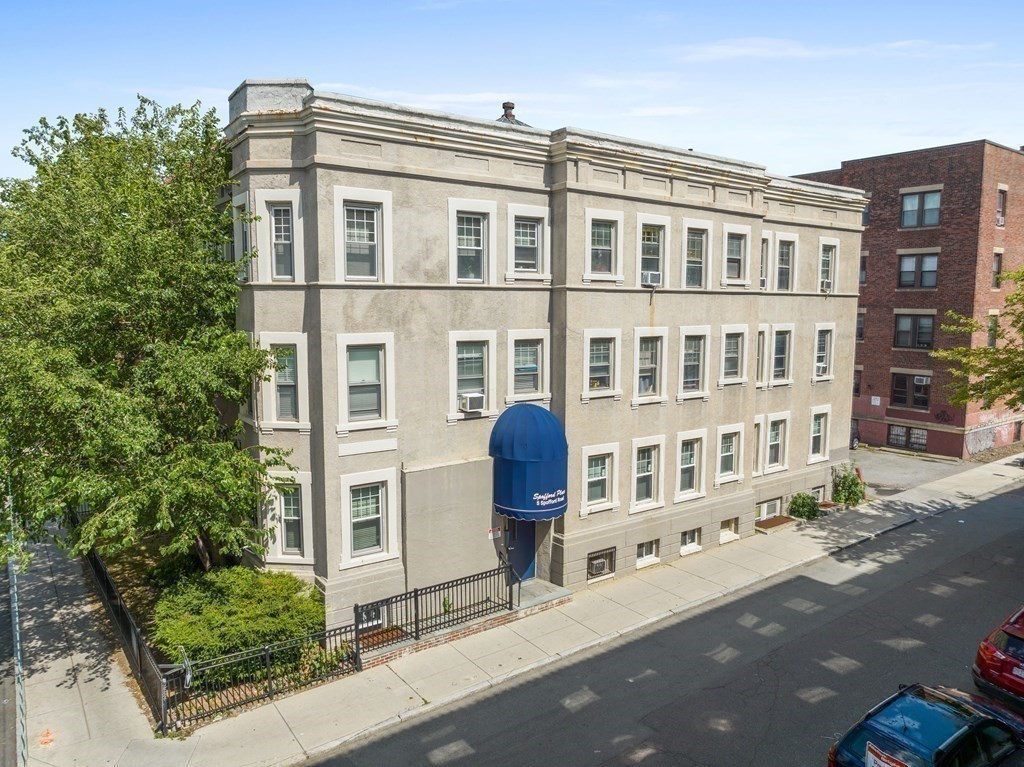 5 Spofford Road, Unit 8 Boston, MA 02134 - Photo 15 of 20 a front view of a building with street view