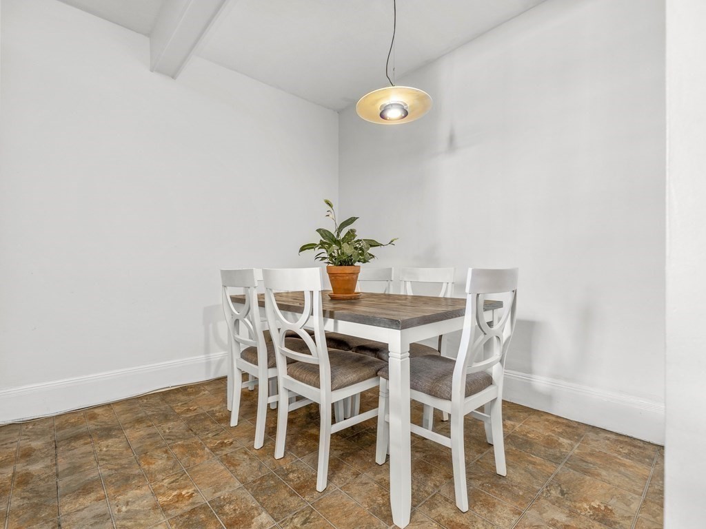 5 Spofford Road, Unit 8 Boston, MA 02134 - Photo 7 of 20 a view of a dining room with furniture