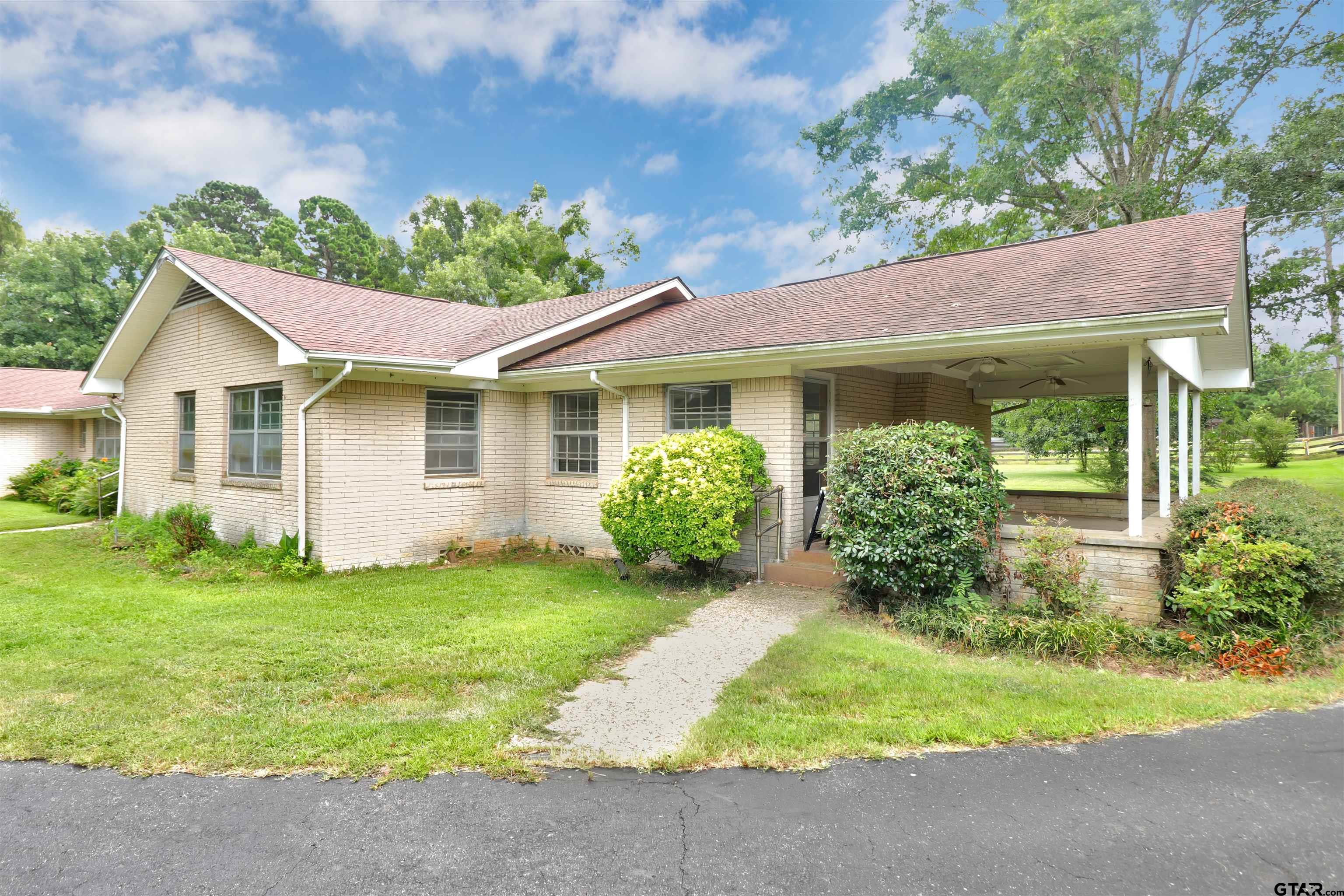 17645 East Us Highway Rusk, TX 75785 - Photo 28 of 31 a view of a house with a garden