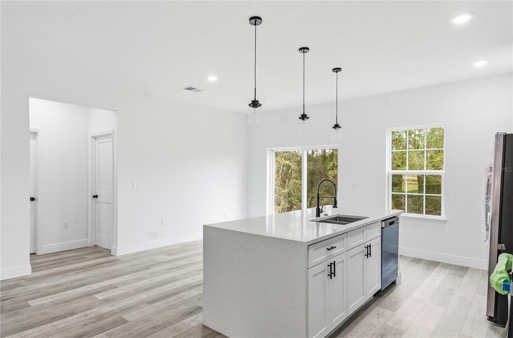 2773 Southwest 147st Street Road Ocala, FL 34473 - Photo 15 of 35 a bathroom with a granite countertop sink and a window