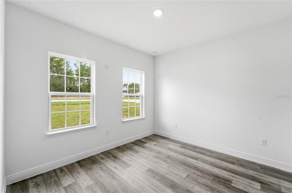 2773 Southwest 147st Street Road Ocala, FL 34473 - Photo 16 of 35 an empty room with a window