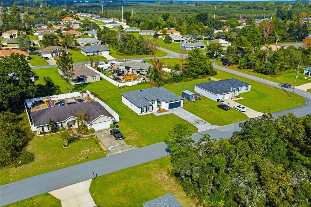 2773 Southwest 147st Street Road Ocala, FL 34473 - Photo 35 of 35 an aerial view of residential houses with outdoor space
