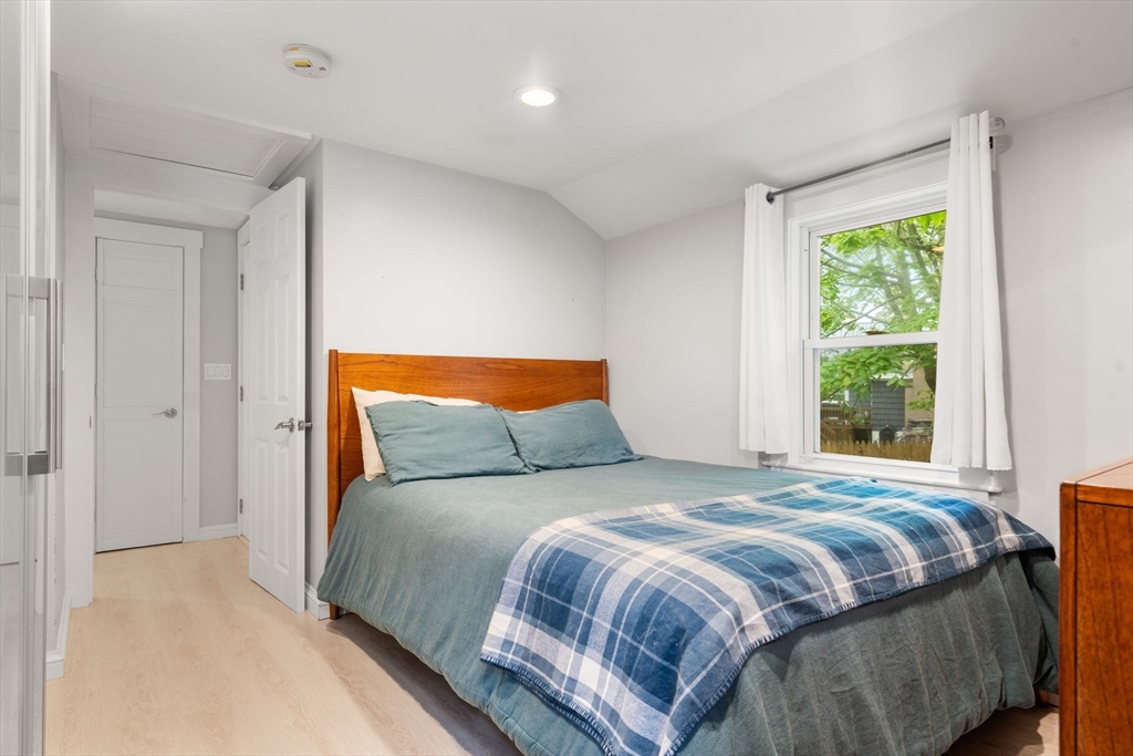 7 Indian Neck Road Wareham, MA 02571 - Photo 27 of 34 a bedroom with a bed and window