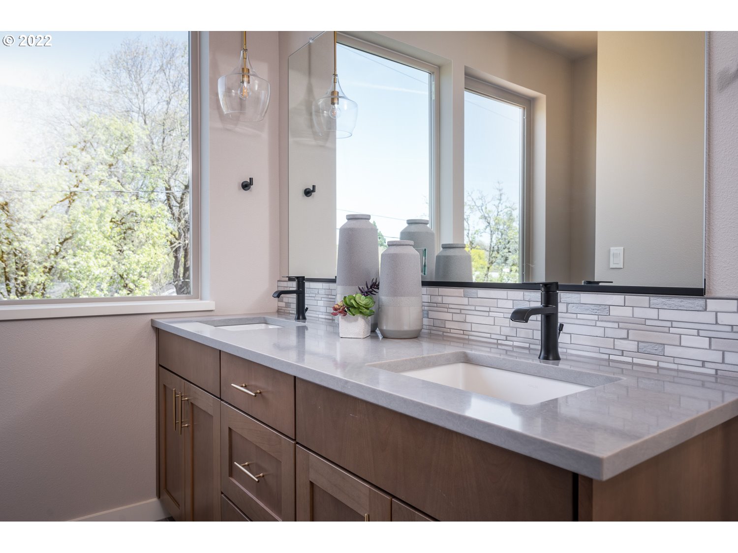 1175 Southeast Grant Street Portland, OR 97214 - Photo 18 of 32 a bathroom with a sink and a mirror