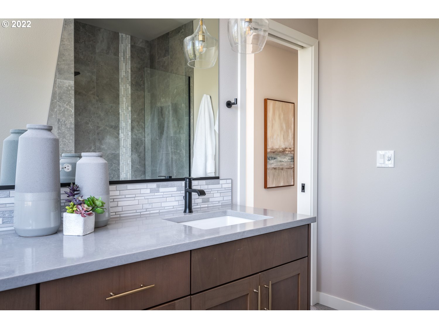 1175 Southeast Grant Street Portland, OR 97214 - Photo 19 of 32 a bathroom with a sink and a mirror