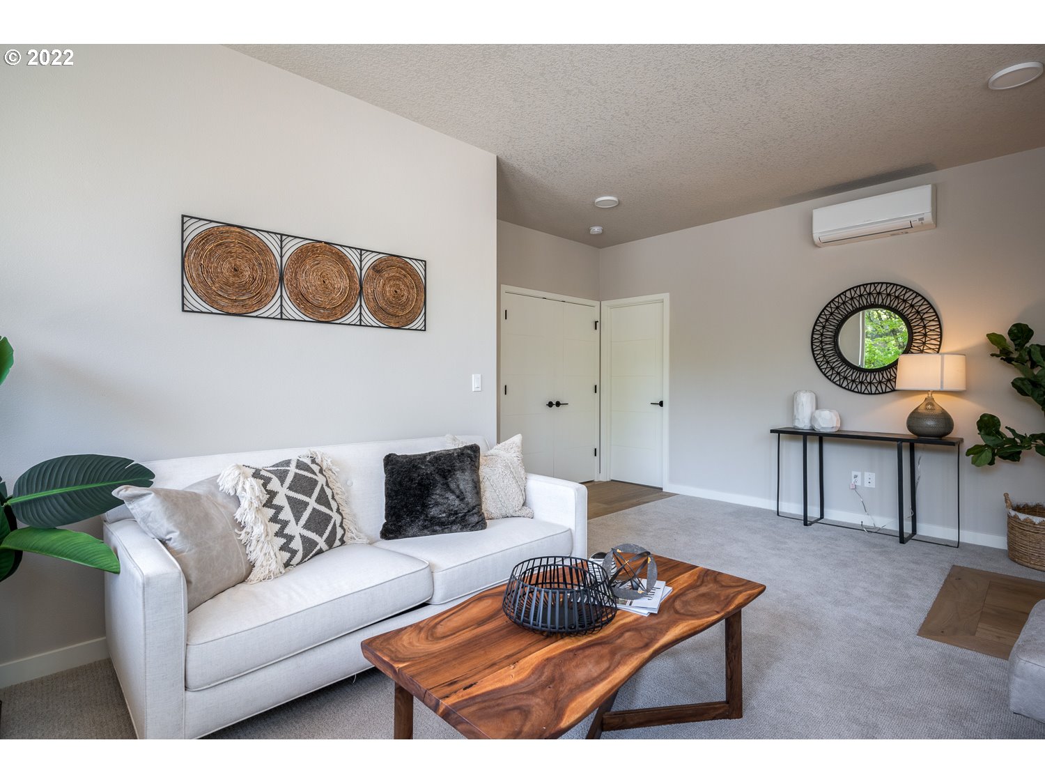 1175 Southeast Grant Street Portland, OR 97214 - Photo 22 of 32 a living room with furniture and a rug