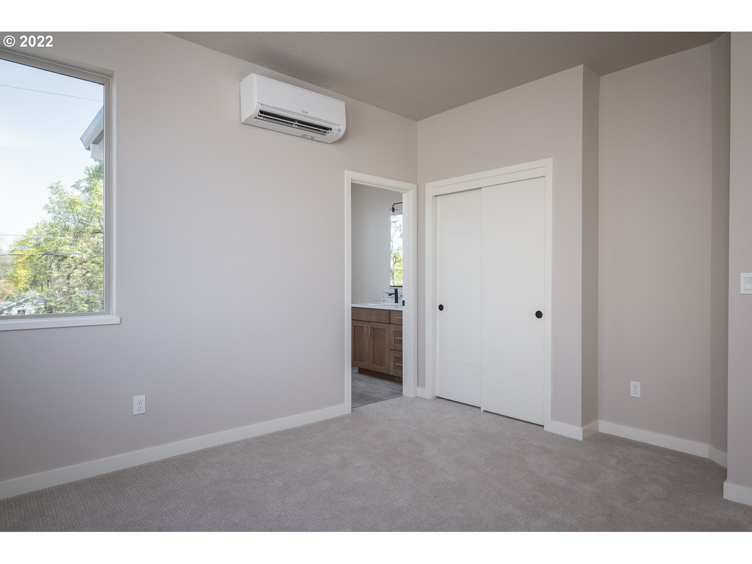 1175 Southeast Grant Street Portland, OR 97214 - Photo 27 of 32 a view of an empty room with a window