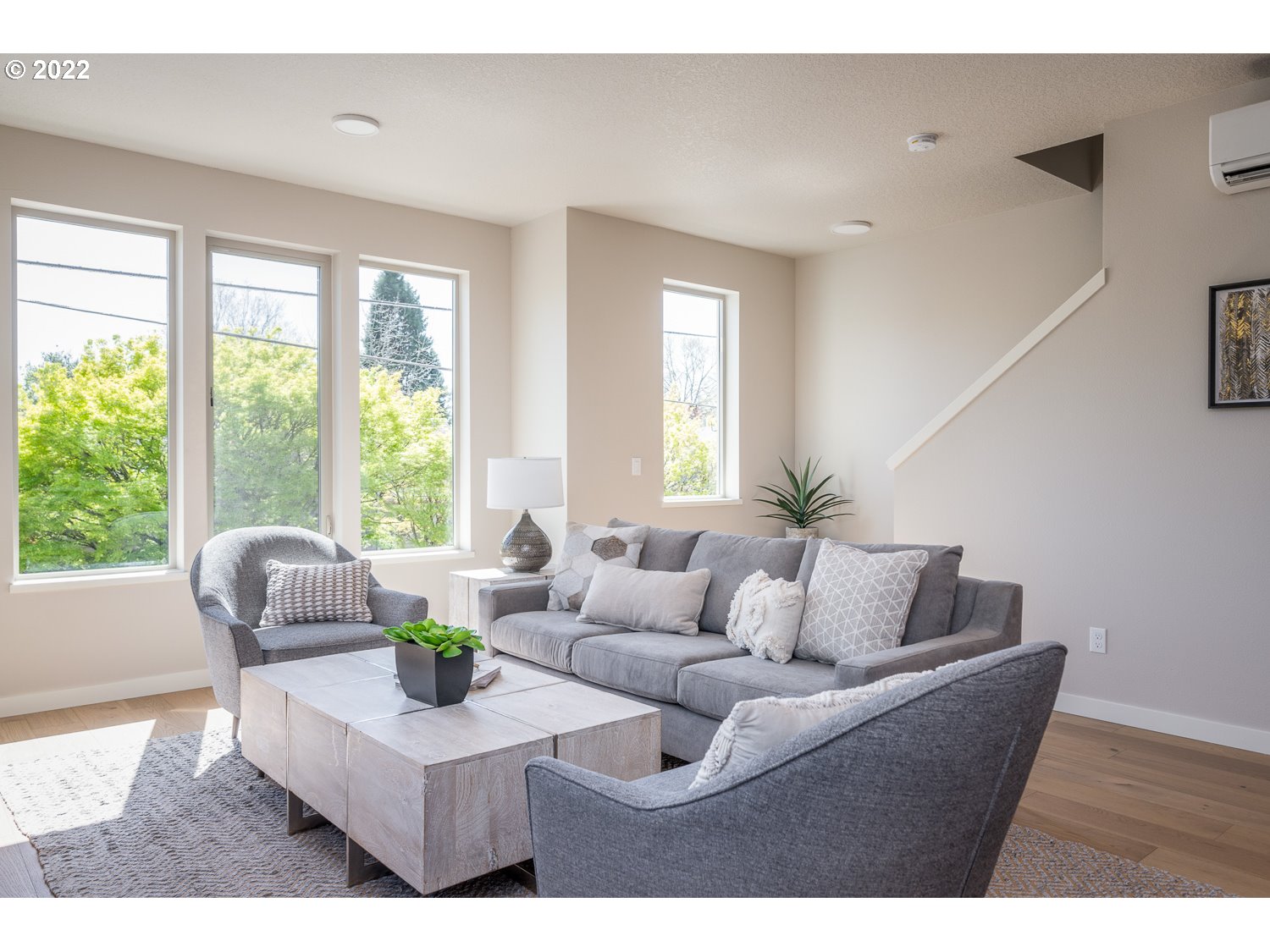 1175 Southeast Grant Street Portland, OR 97214 - Photo 7 of 32 a living room with furniture and a large window