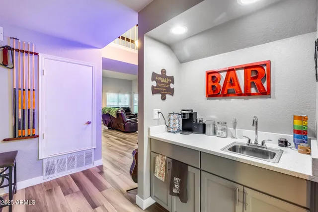 a kitchen with stainless steel appliances a refrigerator stove and microwave