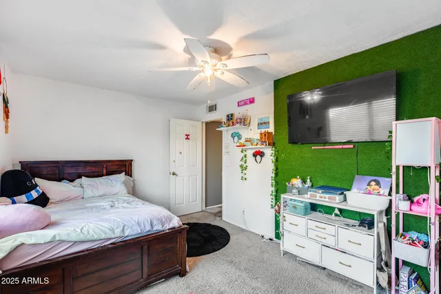 a room with a bed and a window