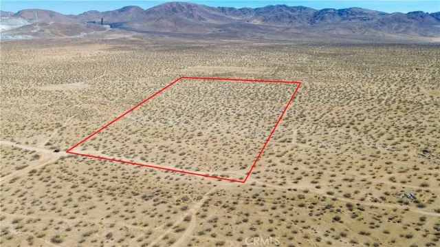 a view of wooden floor and a mountain view