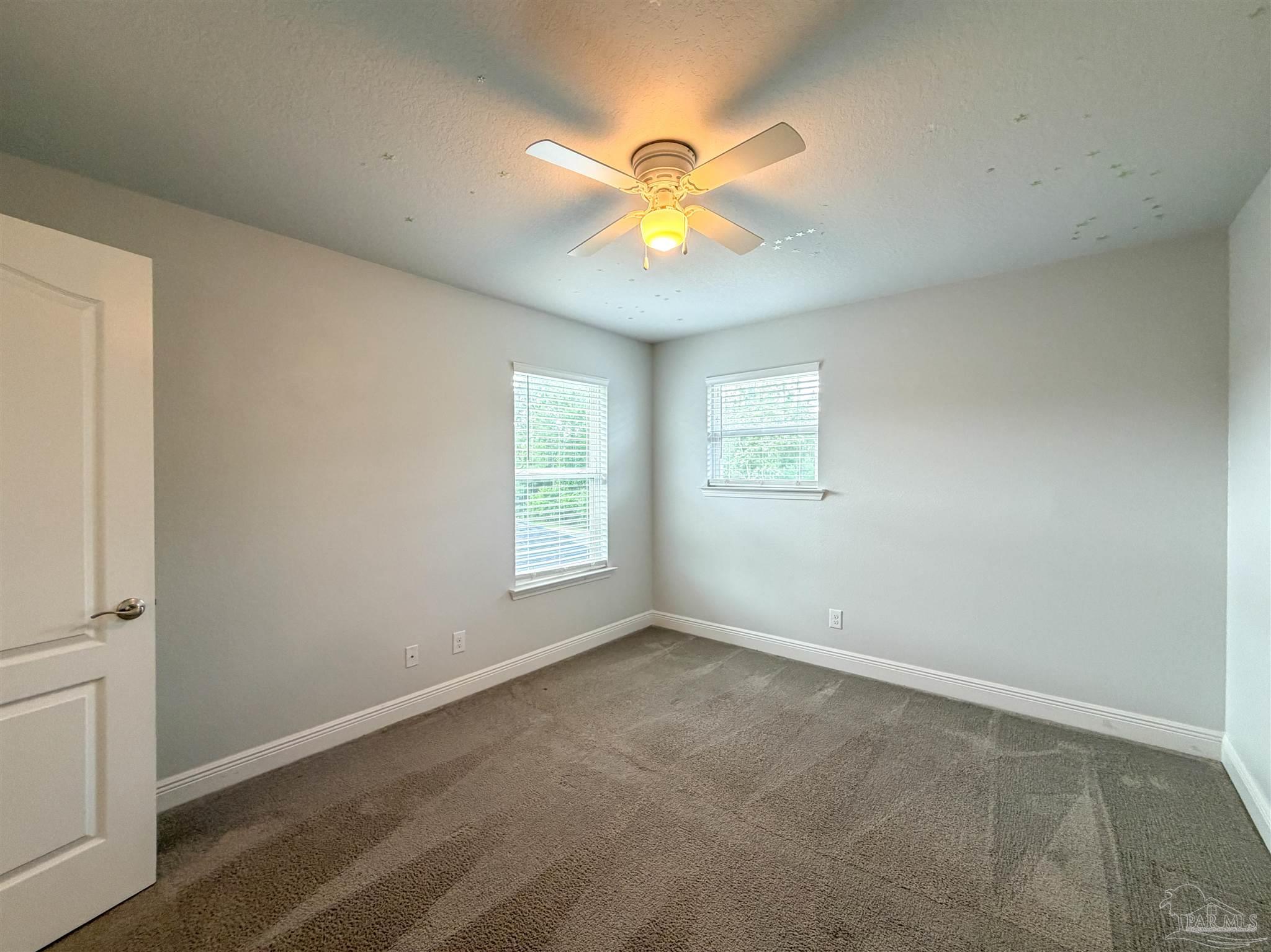 3613 Conley Drive Cantonment, FL 32533 - Photo 21 of 32 a view of an empty room with a window