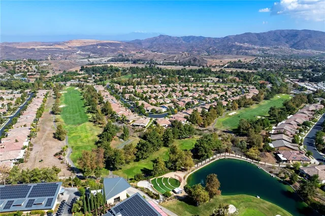 an aerial view of a house with a garden
