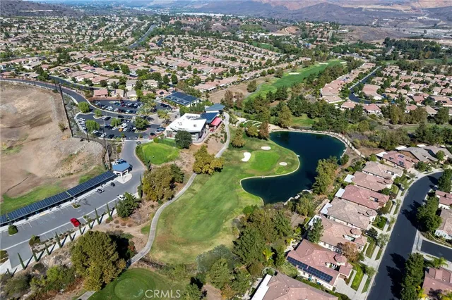 an aerial view of a house with a garden