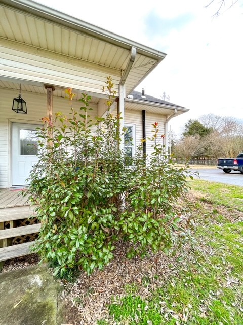 3576 Dog Branch Road Prospect, TN 38477 - Photo 18 of 24 a front view of a house with garden