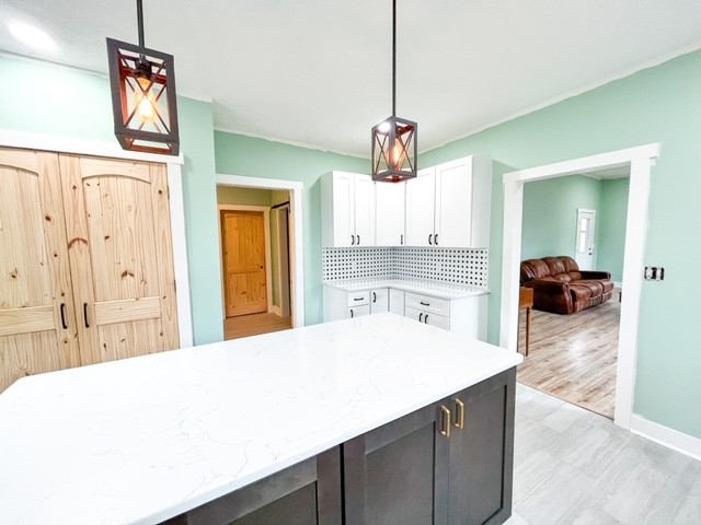 3576 Dog Branch Road Prospect, TN 38477 - Photo 5 of 24 a room with a chandelier and a wooden floor