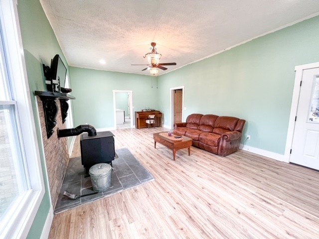 3576 Dog Branch Road Prospect, TN 38477 - Photo 7 of 24 a living room with furniture a flat screen tv and a window