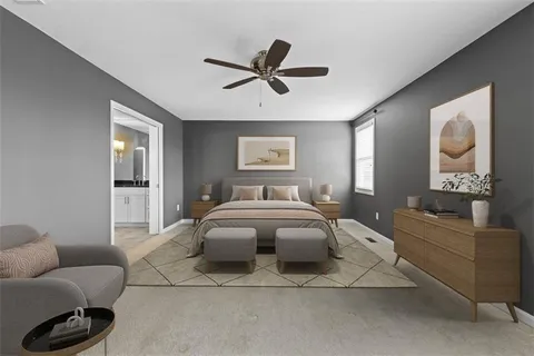 a bedroom with a bed couch and window