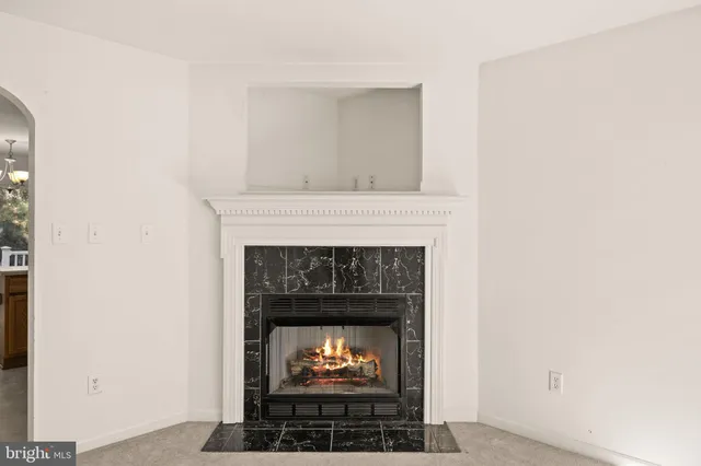 a living room with a fireplace