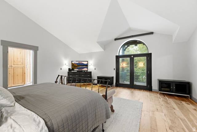 8650 Redden Road Park City, UT 84098 - Photo 17 of 71 Vaulted ceilings, wood-finish flooring, and French doors with an arched transom