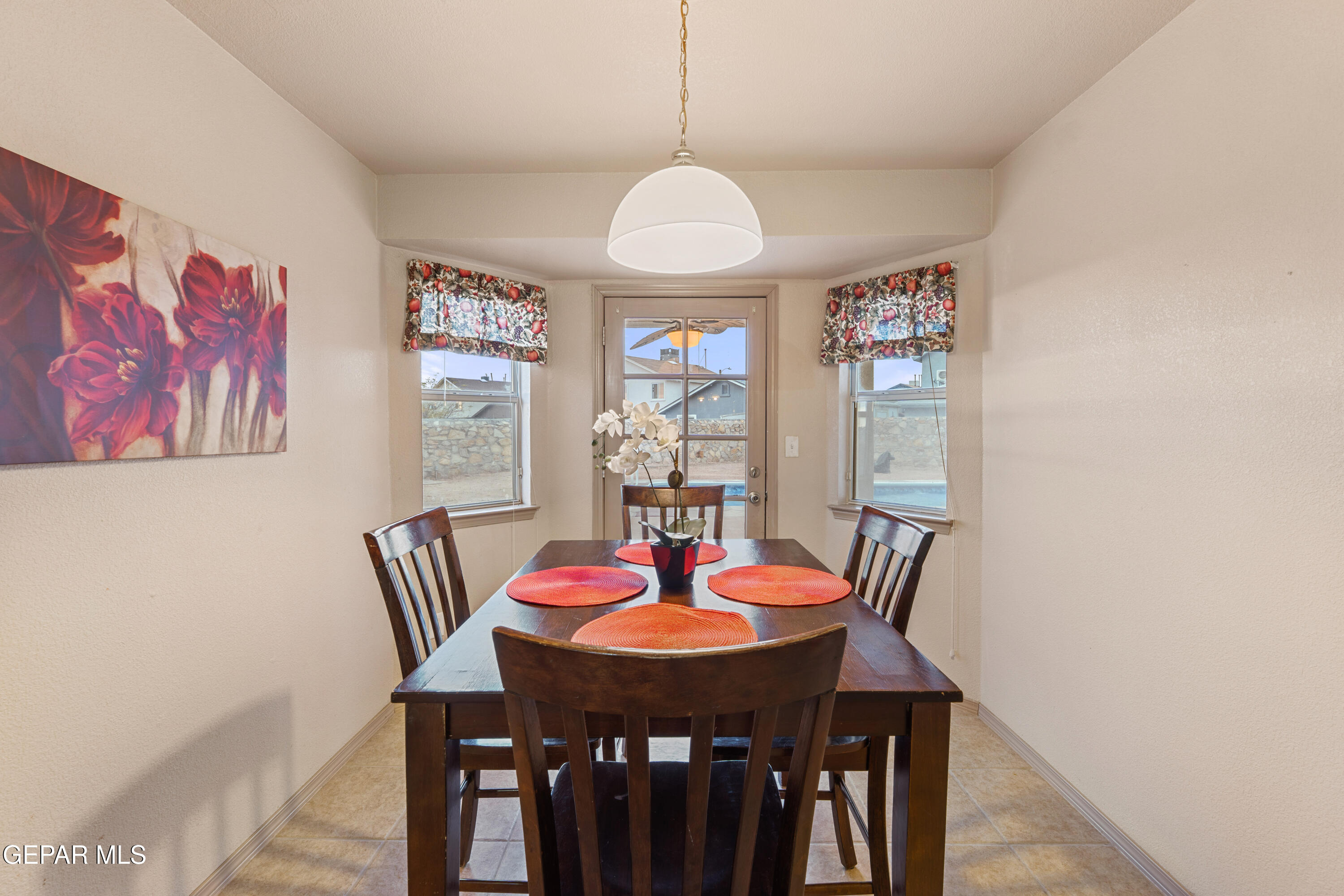 3849 Tierra Roca Place El Paso, TX 79938 - Photo 18 of 44 a view of a dining room with furniture and window