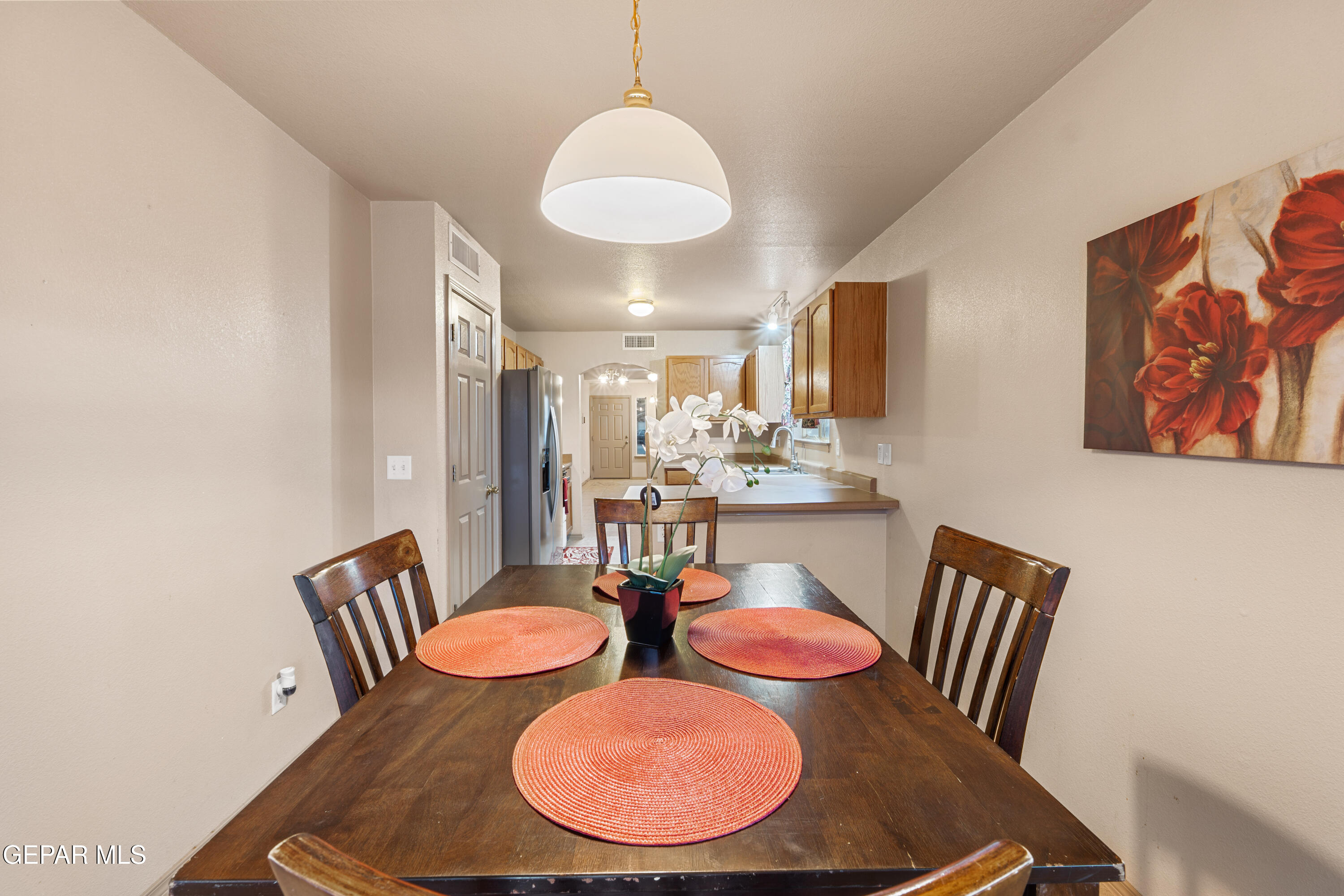 3849 Tierra Roca Place El Paso, TX 79938 - Photo 20 of 44 a view of a dining room with furniture