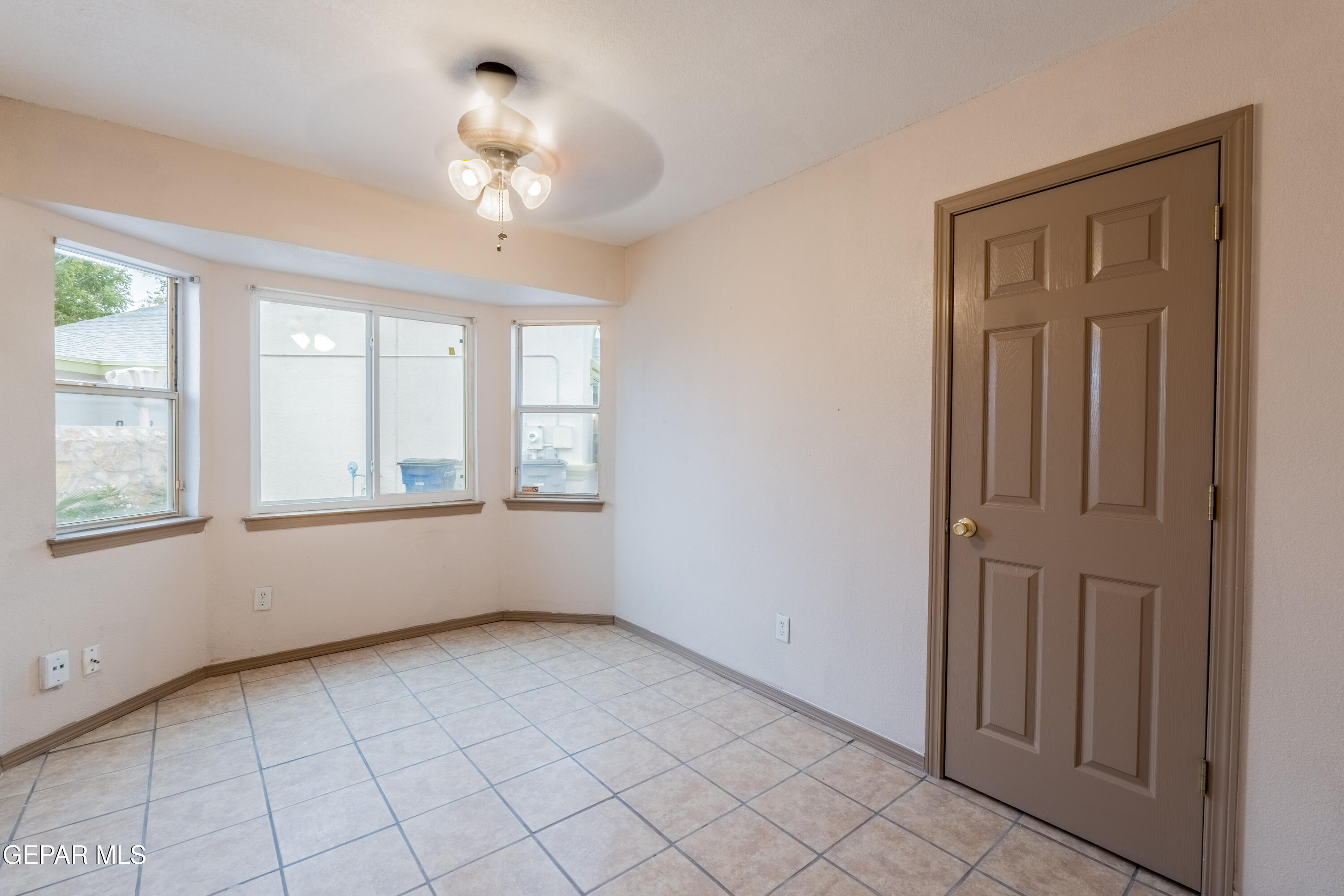 3849 Tierra Roca Place El Paso, TX 79938 - Photo 22 of 44 a view of an empty room with a window