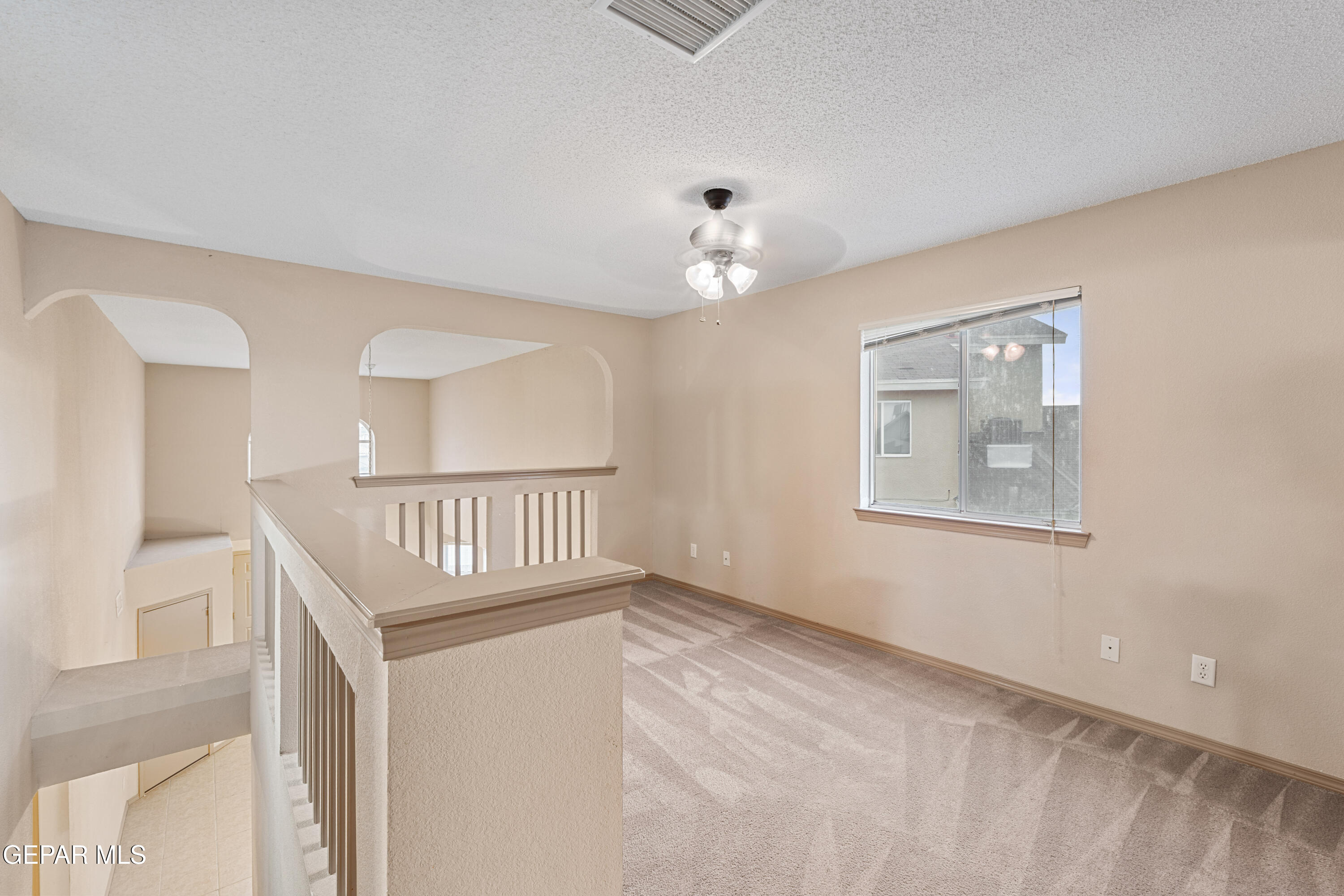 3849 Tierra Roca Place El Paso, TX 79938 - Photo 27 of 44 a view of an empty room with a window